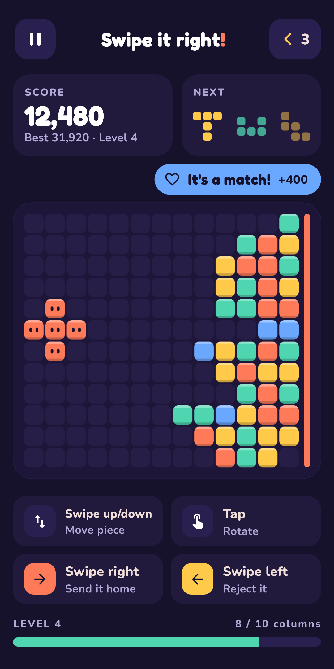 A game in progress: colourful blocks stacked against the wall on the right, a piece entering from the left, and an It's a match! badge.